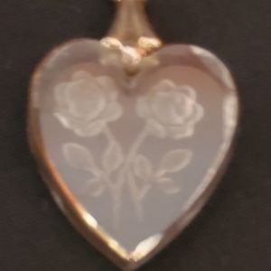 Beautiful antique carved rose pendant